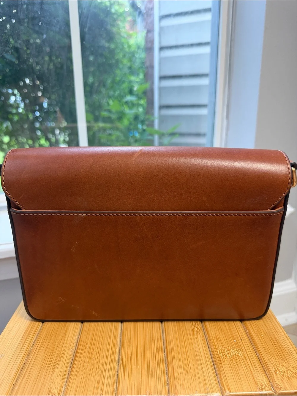 Tory Burch Perforated Leather Messenger in Cognac with Gold Logo